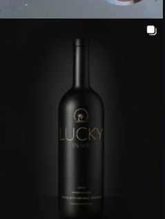 Lucky En Vue matte black bottle, studio shot